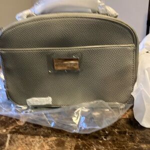 Brand new with tags woman’s crossbody bag w/ detachable strap and dustbag